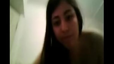 Hot Indian Girl shows off her hot figure in bathroom.mpg