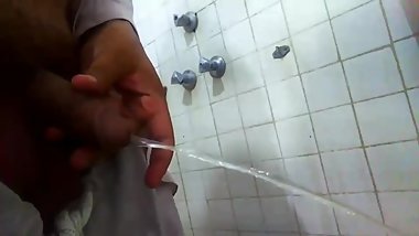 straight guy pissing in public toilet
