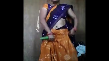 Desi bhabi fucking herself with a cucumber