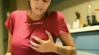 Aroused desi girl touching and squeezing boobs
