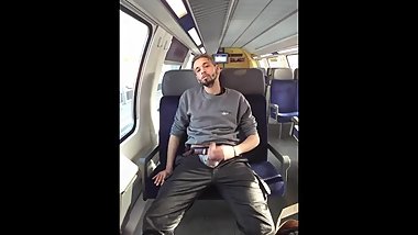 Guy jerking in metro train